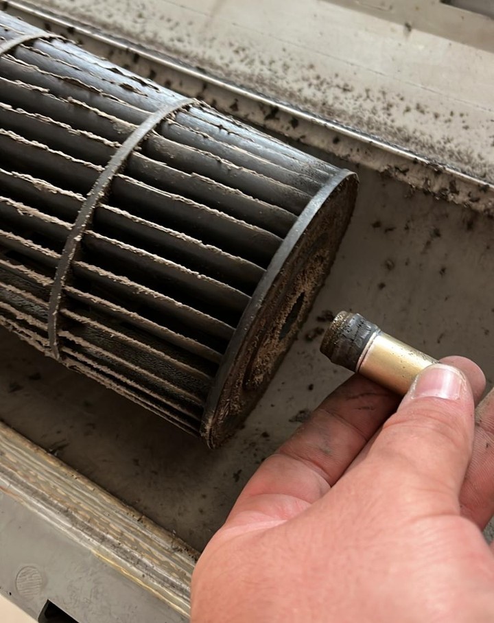 Dirt build-up on an AC fan